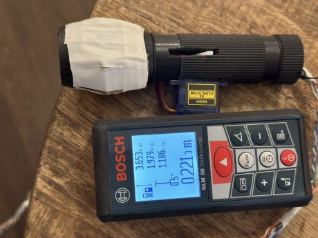 FeelBeam haptic navigator. The lever has moved back towards the user, indicating a close obstacle.